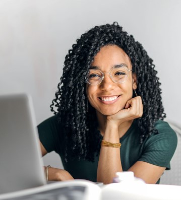 Girl using a laptop.